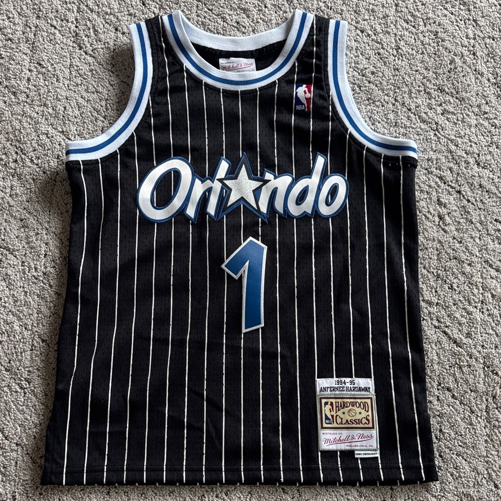 Mitchell & Ness Black Orlando Pinstripe Kids Jersey with Blue and White Trim